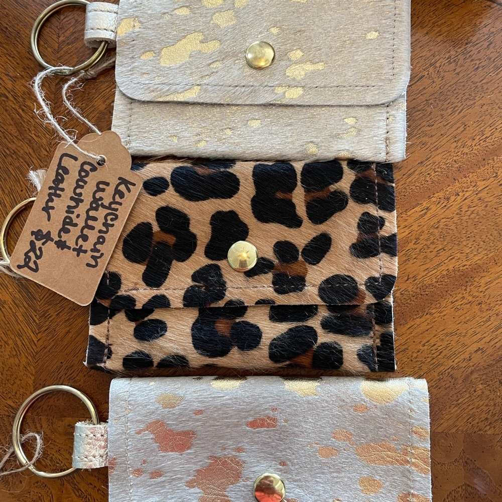 Cowhide Coin purses with keychain holder.
